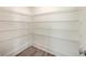 Walk-in pantry featuring an abundance of shelving and wood floors at 219 Clearblue Loop, Summerville, SC 29486