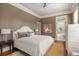 Bedroom with rug and decorative mirror at 23 Elliott St, Charleston, SC 29401