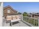 Outdoor lounge with comfortable seating and table offers a charming space to relax and enjoy the views at 23 Elliott St, Charleston, SC 29401