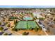 A serene community view with tennis courts and pool for active lifestyle in a meticulously landscaped neighborhood at 236 River Martin Ct, Summerville, SC 29483
