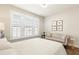 Bedroom featuring bright natural light, white bedding and a seating area at 236 River Martin Ct, Summerville, SC 29483