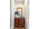 Hallway features a wooden dresser with a mirror and decor on top at 236 River Martin Ct, Summerville, SC 29483