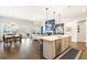 Open-concept living space features hardwood floors and natural light at 236 River Martin Ct, Summerville, SC 29483