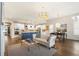 Open-concept living space with hardwood floors and natural light at 236 River Martin Ct, Summerville, SC 29483
