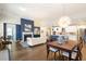 Bright open-concept living space connecting the kitchen, dining, and living area at 236 River Martin Ct, Summerville, SC 29483