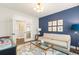 Office space with blue accent wall has lots of natural light at 236 River Martin Ct, Summerville, SC 29483