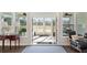 Sunroom with tiled floor has beautiful views of the lake at 236 River Martin Ct, Summerville, SC 29483