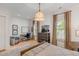 Serene bedroom with hardwood floors, modern desk, and comfortable bed at 25 Duany Rd, Mount Pleasant, SC 29464