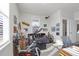 Bright bedroom featuring exercise equipment, comfortable seating area, and home office at 2613 Hatch Dr, Johns Island, SC 29455