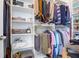 Organized walk-in closet with shelving, hanging rods, and storage for clothes, shoes, and accessories at 2613 Hatch Dr, Johns Island, SC 29455