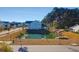 Beautiful home featuring a pond view, well-manicured lawn, and lush, mature trees at 2613 Hatch Dr, Johns Island, SC 29455