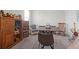 Play room offers a fun space with decorative wood cabinet, chair, and large table for play and creativity at 2613 Hatch Dr, Johns Island, SC 29455