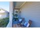 Inviting porch seating with rocking chairs and cushions create a cozy, relaxing outdoor space at 2613 Hatch Dr, Johns Island, SC 29455