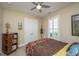 Cozy bedroom featuring a closet with double doors and a ceiling fan at 3034 Cross Vine Ln, Summerville, SC 29483