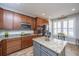 Well-appointed kitchen with stainless steel appliances, a center island, and ample cabinet space at 3034 Cross Vine Ln, Summerville, SC 29483