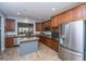 Spacious kitchen with stainless steel appliances, granite countertops, and a central island at 3034 Cross Vine Ln, Summerville, SC 29483