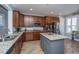 Modern kitchen featuring granite countertops, stainless steel appliances, and wood cabinets at 3034 Cross Vine Ln, Summerville, SC 29483