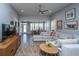 Bright living room with a comfortable sectional sofa, stylish decor, and an open layout at 3034 Cross Vine Ln, Summerville, SC 29483