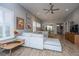 Bright living room with a comfortable sectional sofa, modern decor, and plenty of natural light at 3034 Cross Vine Ln, Summerville, SC 29483