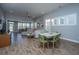 Spacious living room with modern flooring, recessed lighting, and a view of the outdoor space at 3034 Cross Vine Ln, Summerville, SC 29483