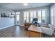 Bright home office space with natural light, modern desk, and a comfortable chair at 3034 Cross Vine Ln, Summerville, SC 29483