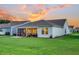 A lovely backyard with a screened patio and grill at 306 Autumn Azalea Way, Summerville, SC 29486