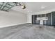 This is a large finished garage with lots of storage cabinets and high ceilings at 306 Autumn Azalea Way, Summerville, SC 29486
