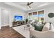 Bright living room with comfortable seating, large windows, and stylish decor for a welcoming atmosphere at 306 Autumn Azalea Way, Summerville, SC 29486