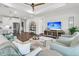 Inviting living space with comfortable seating, modern decor, and an open layout to the kitchen at 306 Autumn Azalea Way, Summerville, SC 29486