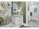 This mud room features drawers, a seat with a decorative pillow and access to the laundry room at 306 Autumn Azalea Way, Summerville, SC 29486