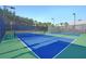 These pristine, well-lit pickleball courts are ready for an evening match with friends and neighbors at 306 Autumn Azalea Way, Summerville, SC 29486