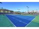 Enjoy tennis or pickleball on this property's beautifully maintained and fully lit athletic courts at 306 Autumn Azalea Way, Summerville, SC 29486