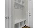 Mudroom entry with bench seat, hooks, storage cubbies, and access to garage and front door at 3066 Emma Ln, Mount Pleasant, SC 29466