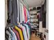Walk-in closet with ample hanging and shelf space at 33 Calhoun St # 218, Charleston, SC 29401