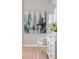 Close-up of stylish wall art with a cityscape theme in a modernly decorated home at 33 Calhoun St # 218, Charleston, SC 29401