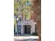 Residential entrance with stone trim and decorative ironwork at 33 Calhoun at 33 Calhoun St # 218, Charleston, SC 29401