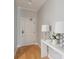 Entryway featuring stylish decor, modern lamps, and a clean, bright aesthetic at 33 Calhoun St # 218, Charleston, SC 29401