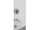 Close up of modern shower with chrome fixtures, sleek design, and white tile surround at 33 Calhoun St # 218, Charleston, SC 29401
