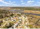 Beautiful coastal community with winding creek and marsh views under a bright sunny sky at 4258 Jacobs Pt Ct, Ravenel, SC 29470