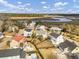 Aerial view of homes in a neighborhood with views of the marsh and inter coastal waterway at 4258 Jacobs Pt Ct, Ravenel, SC 29470