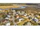 Aerial view of the neighborhood highlighting a coastal community with marsh views and winding streets at 4258 Jacobs Pt Ct, Ravenel, SC 29470