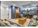 Finished basement offers comfortable seating, ample lighting, and a large entertainment screen at 4258 Jacobs Pt Ct, Ravenel, SC 29470