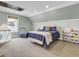 Spacious bedroom with soft blue walls, carpet floors, and ample space for play at 4258 Jacobs Pt Ct, Ravenel, SC 29470