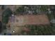 Aerial view of a home, highlighting its privacy surrounded by trees and a spacious lot at 488 Society Rd # A&B, McClellanville, SC 29458