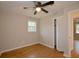 Comfortable bedroom with hardwood floors, closet, ceiling fan, and neutral paint tones at 488 Society Rd # A&B, McClellanville, SC 29458