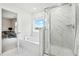 Bright and luxurious bathroom with marble shower, soaking tub, and an adjacent vanity at 491 Richfield Way, Summerville, SC 29486