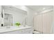 Well-lit bathroom with double sinks, white cabinets, and a shower-tub combination at 491 Richfield Way, Summerville, SC 29486