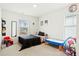 bedroom with brightly colored decor, toys, and a view of the neighborhood at 491 Richfield Way, Summerville, SC 29486