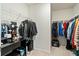 Walk-in closet with hanging racks, shelving, full length mirror, and a safe for storage at 491 Richfield Way, Summerville, SC 29486