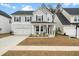 Charming two-story home with a welcoming front porch and well-manicured lawn at 491 Richfield Way, Summerville, SC 29486